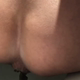 Filmed from behind over the toilet, tattooed Nazzy pushes out a long hanging turd that drops into the bowl. Presented in 720P vertical HD format. Over 2 minutes.